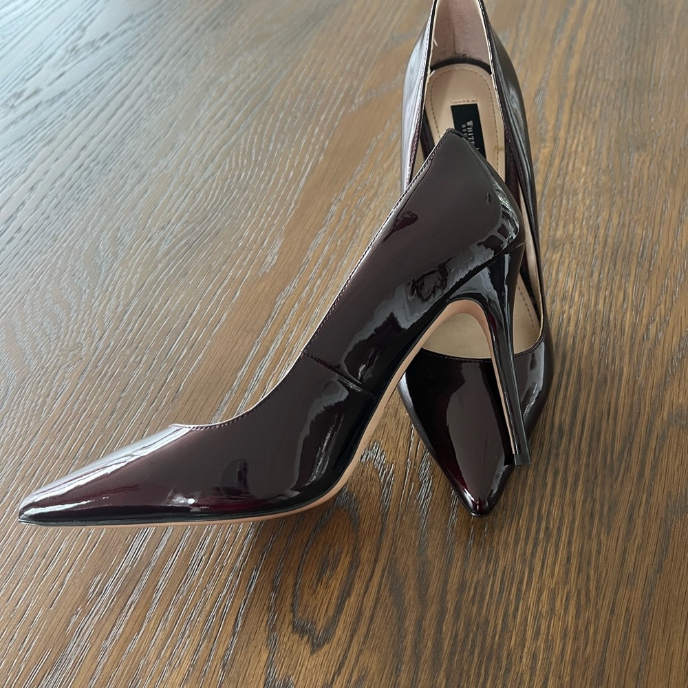 Wine patent leather White House Black market pumps.  Size 8.